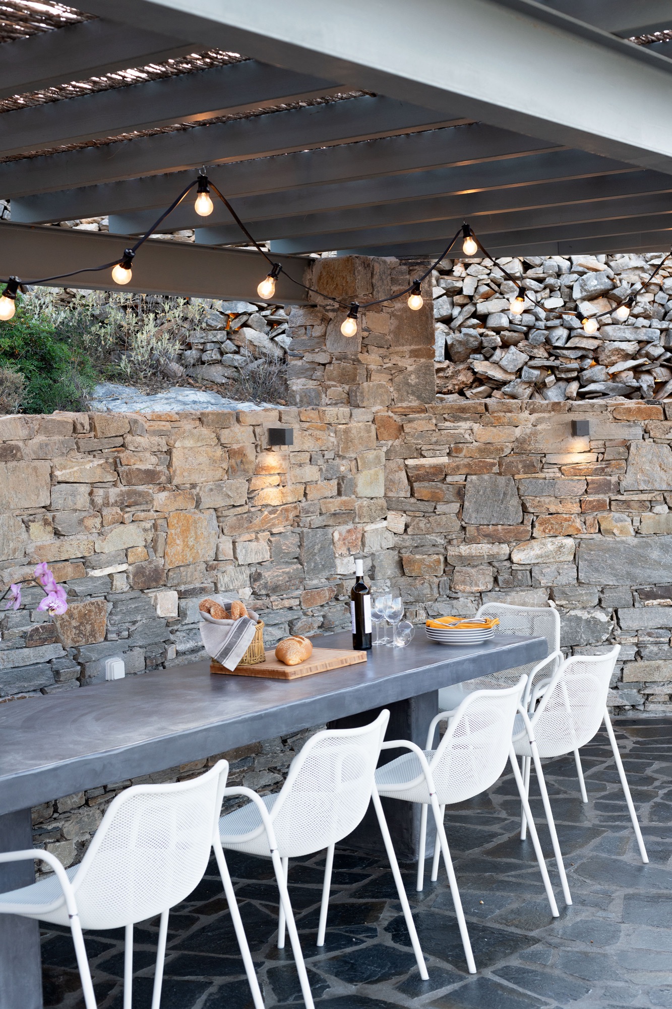 The outdoor dining area beside the pool
